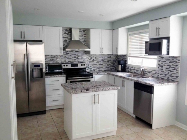 Picture of Painted White Kitchen Cabinets Before And After White Wooden Floating Storage Cabinets